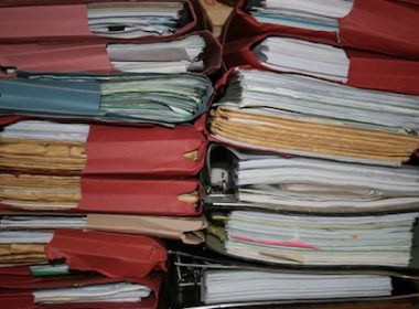 Piles of files. Editorial intern. Alternatives Journal.